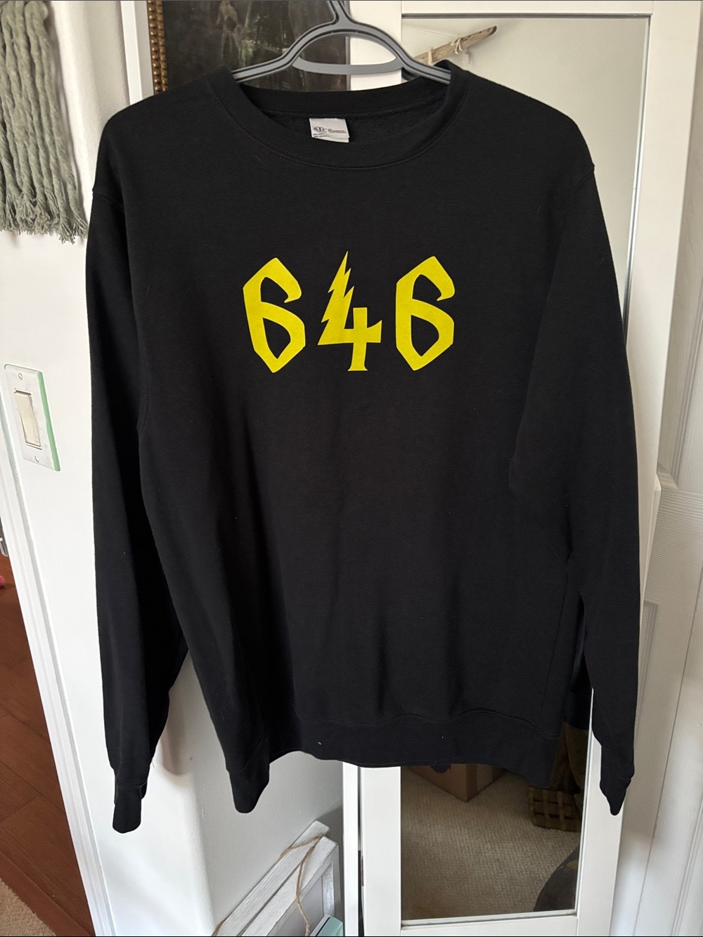 Black Crewneck Sweater with Yellow Graphic